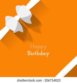 Simple card for birthday with a white paper bow on orange background