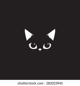 Simple cartoon cat icon on a black background. Vector Illustration.