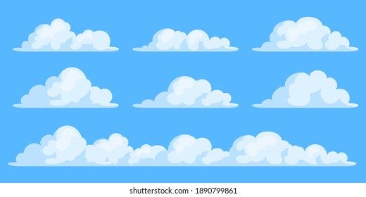 Simple colección vectorial de nubes de dibujos animados aislados en el cielo azul.