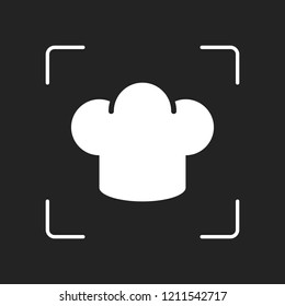 Simple chef hat icon. Kitchen logo. White object in camera autofocus on dark background