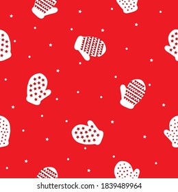 Simple Christmas pattern. Cute white mittens with patterns. Red background. Vector texture. Fashionable holiday print for Wallpaper.