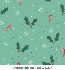 Simple Christmas pattern. Holly, caramel cane and snowflakes. Pale green background. Holiday print for packaging and Wallpaper.