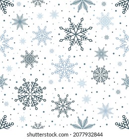 Simple patrón de Navidad sin costura. Copos de nieve con diferentes adornos. Sobre fondo negro