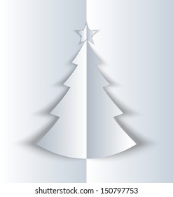 Simple Christmas tree made of folded paper with shadow