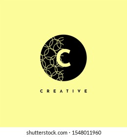 simple circle C logo letter with half patterned creative design concept isolated on yellow background