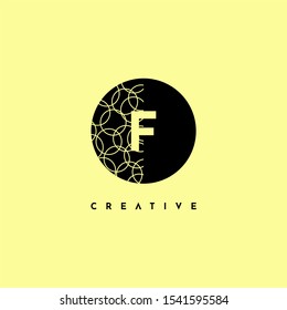 simple circle F logo letter with half patterned creative design concept isolated on yellow background