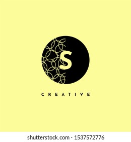 simple circle S logo letter with half patterned creative design concept isolated on yellow background