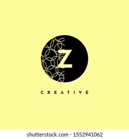 simple circle Z logo letter with half patterned creative design concept isolated on yellow background