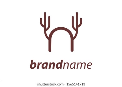 Simple and Clean logo design deer combination with letter N in brown color.