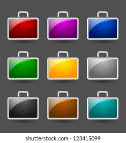 Simple colorful glossy suitcase icons isolated on dark grey background