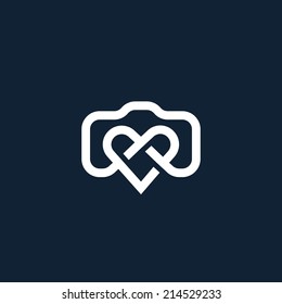 Simple creative photographer symbol, icon, logo consisting of camera and heart shapes