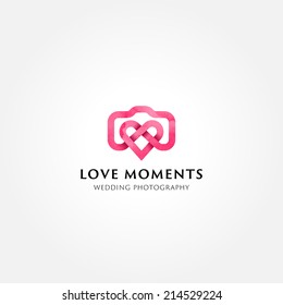 Simple creative wedding photographer symbol, icon, logo consisting of camera and heart