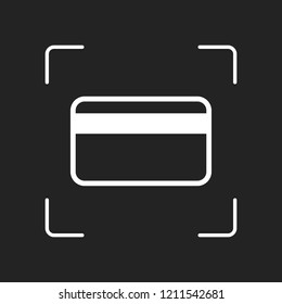 Simple credit card icon. White object in camera autofocus on dark background