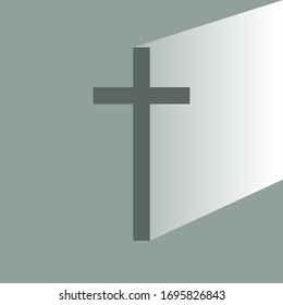 A simple cross on a gray background with incident light.