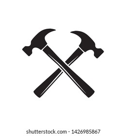 Simple crossed hammers vector symbol