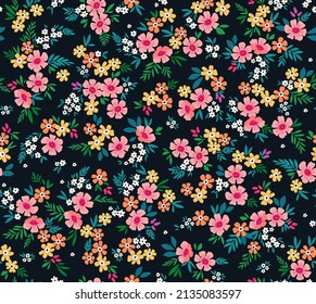 Simple cute pattern in small colorful flowers on black background. Liberty style. Ditsy print. Floral seamless background. The elegant the template for fashion prints.