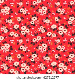 Simple cute pattern in small white and pink flowers on bright red background. Liberty style. Ditsy print. Floral seamless background. The elegant the template for fashion prints.