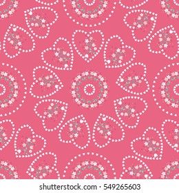 Simple cute pattern in small-scale flowers and hearts. Mandala millefleurs. Floral seamless background for textile or book covers, manufacturing, wallpapers, print, gift wrap and scrapbooking.