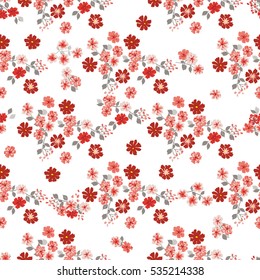 Simple cute pattern in small-scale red flowers. Millefleurs. Liberty style. Floral seamless background for textile or book covers, manufacturing, wallpapers, print, gift wrap and scrapbooking.