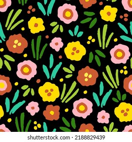 Simple dark floral vector seamless pattern. Yellow, pink flowers, green grass and leaves on a black background. For fabric prints, textiles, clothing.