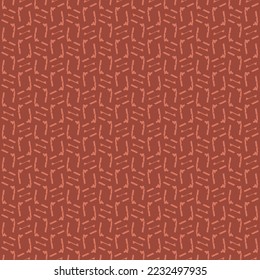 Decoración sencilla con marcas, líneas cortas o líneas rotas. Diseño plano repetido en tonos rojos. Patrón textil.