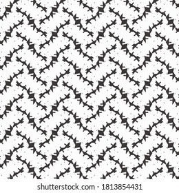 La decoración es sencilla, con pequeños pictogramas geométricos, dispuestos en el camino de unas líneas cruzadas y ligeramente onduladas. Patrón monocromo.