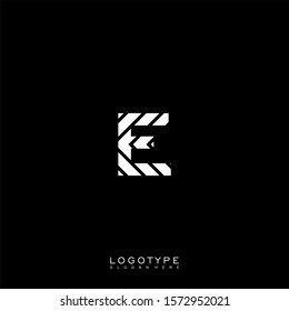 simple decorative white striped E logotype isolated on black background.