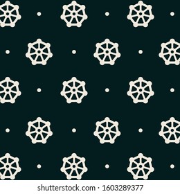 simple design two color white cream icon on dark green background.