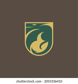 simple dragon and shield logo .vector illustration for business logo or icon