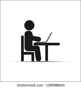 Simple drawing, a person sitting at a table and working on a laptop