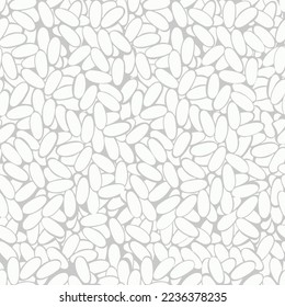 A simple drawing of rice grains on a gray background. Seamless pattern. A traditional symbol of wealth and happiness. Asian food. For wallpaper, printing on fabric, wrapping, background.