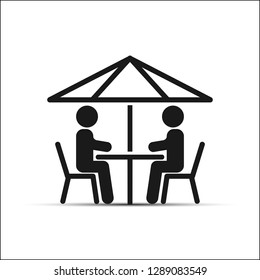 Simple drawing, two people sitting at a table under an umbrella