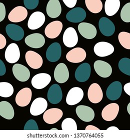 Simple egg pattern. happy Easter. Black background, cute colored eggs. The print is well suited for banner, postcard,packaging and textiles.