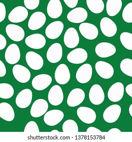 Simple egg pattern. happy Easter. Green background,white eggs. The print is well suited for postcards,packaging,banners and textiles.