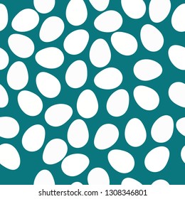 Simple egg pattern. Mosaic. Dark blue background, small white eggs. Good print for textiles, banners, postcards.