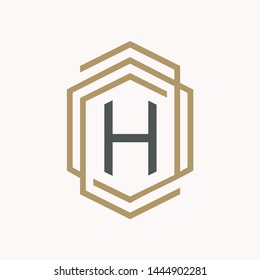 Simple and elegance letter H symbol inside abstract hexagon on the pink background. Simple emblem letter for your best business symbol. Vector illustration EPS.8 EPS.10