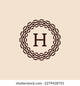 simple and elegant initial letter H ornamental circle frame logo