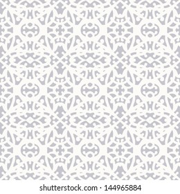 Simple elegant lace pattern with white shapes on grey silver background in art deco style Texture for web, print, holiday home decor, winter fashion, textile, wedding invitation, seasons greeting card