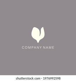 Simple, elegant, minimalistic, stylized tulip symbol or logo, consisting of one element. Made with a smoothed spot.