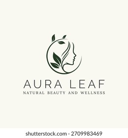 Un logotipo sencillo, elegante y mono line que presenta la silueta de la cara de una mujer en perfil enmarcado por el cabello suelto y un círculo de hojas orgánicas.