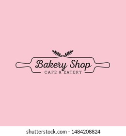 Simple feminine bakery logo design with wheat and wood rolling pin