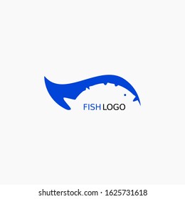 Simple fish logo in blue, swimming in sea water, logo for the fish business, seafood, restaurants, fishing