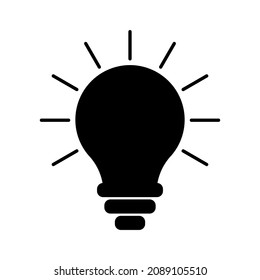 Simple flat black and white silhouette of a burning incandescent light bulb. Lamp vector icon. Idea concept