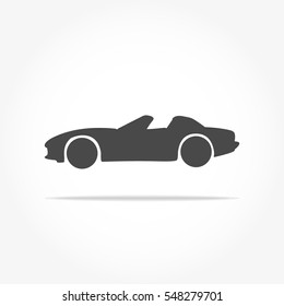 simple floating convertible  sedan car icon viewed from the side colored in dark grey with drop shadow