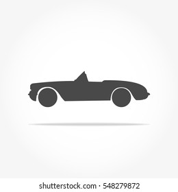 simple floating convertible sedan car icon viewed from the side colored in dark grey with drop shadow