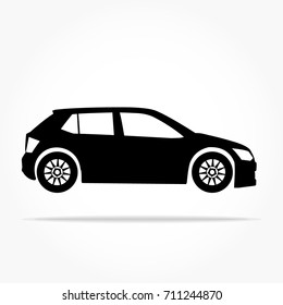 simple floating hatchback car icon viewed from the side colored in flat black with detailed rims and drop shadow