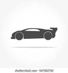 simple floating racing car icon viewed from the side colored in dark grey with drop shadow