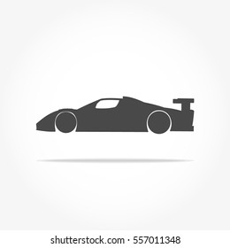 simple floating racing car icon viewed from the side colored in dark grey with drop shadow