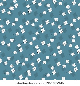Simple floral background with white flowers on a blue background. Drawn floral textures. Blue ornament to decorate fabrics, tiles and paper and wallpaper on the wall.