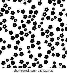 Simple floral pattern of abstract black flowers. Small black flowers . White background. Print a color in a flower. Floral seamless background. Elegant template for fashionable prints.